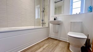 MAIN BATHROOM WITH BATH AND SHOWER- click for photo gallery